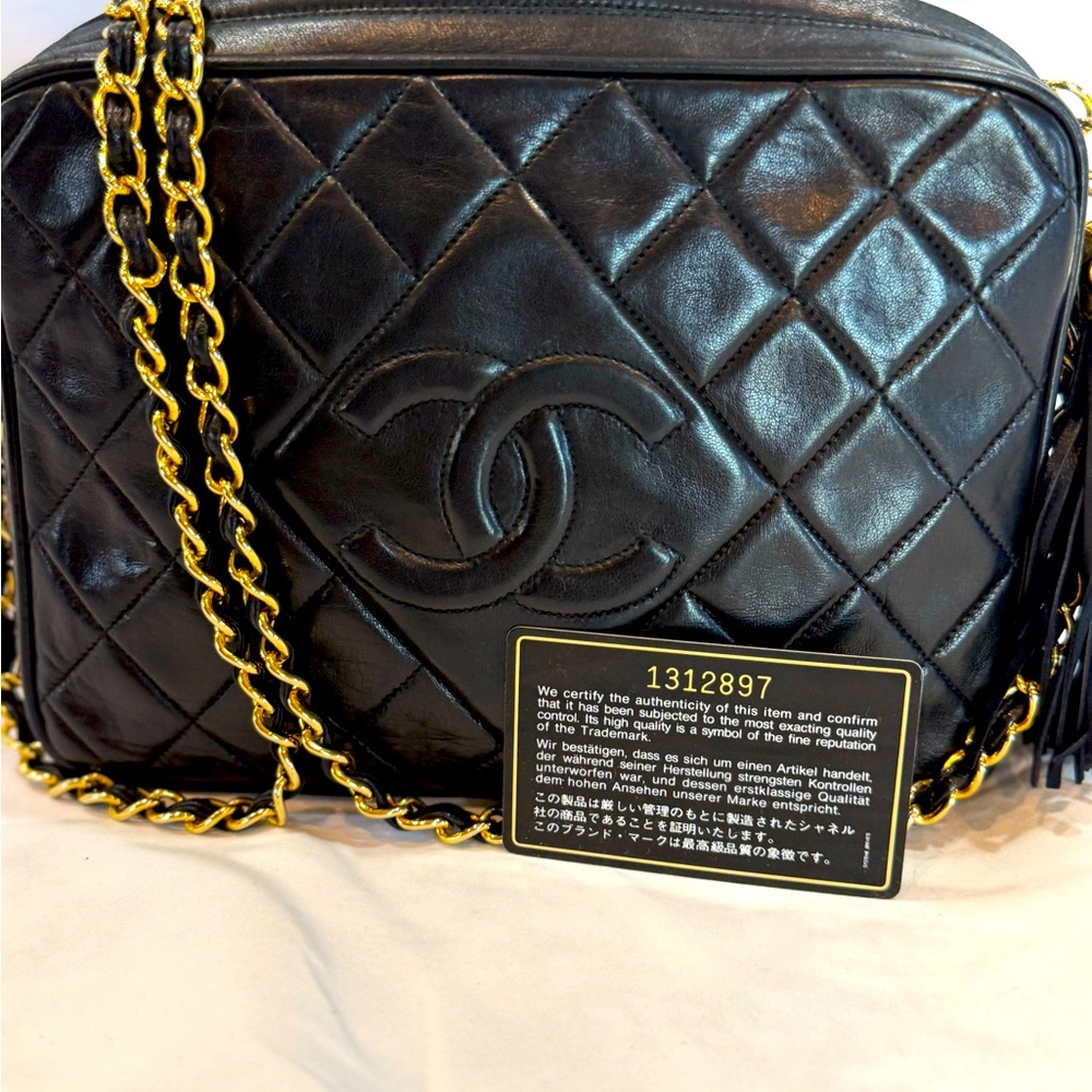 GORGEOUS AUTHENTIC VINTAGE Chanel - Black with Tassel 24 K Gold Hardware